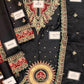 E1098 Kaftan-Style Silk — 3-Piece Unstitched Suit in Black & Gold; supplied design and embroidery detail 1.