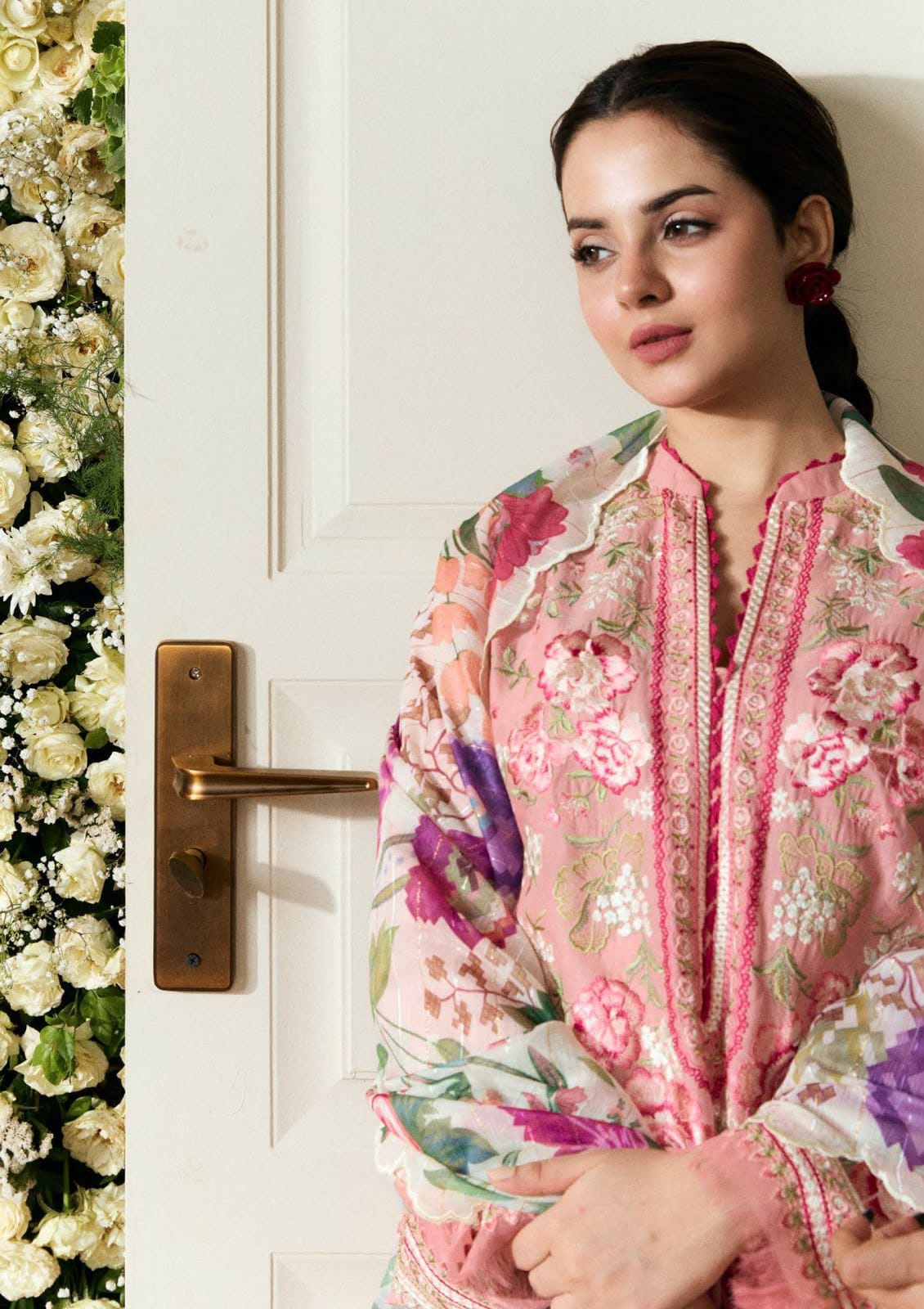 Blush embroidered Dhanak unstitched three-piece suit; original model close-up.