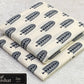 All-Over Printed Khaddar - 2-Piece Unstitched Suit; Ivory and Navy Paisley, actual fabric and design detail.