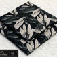 All-Over Printed Khaddar - 2-Piece Unstitched Suit; Charcoal and Ivory Leaves, actual fabric and design detail.