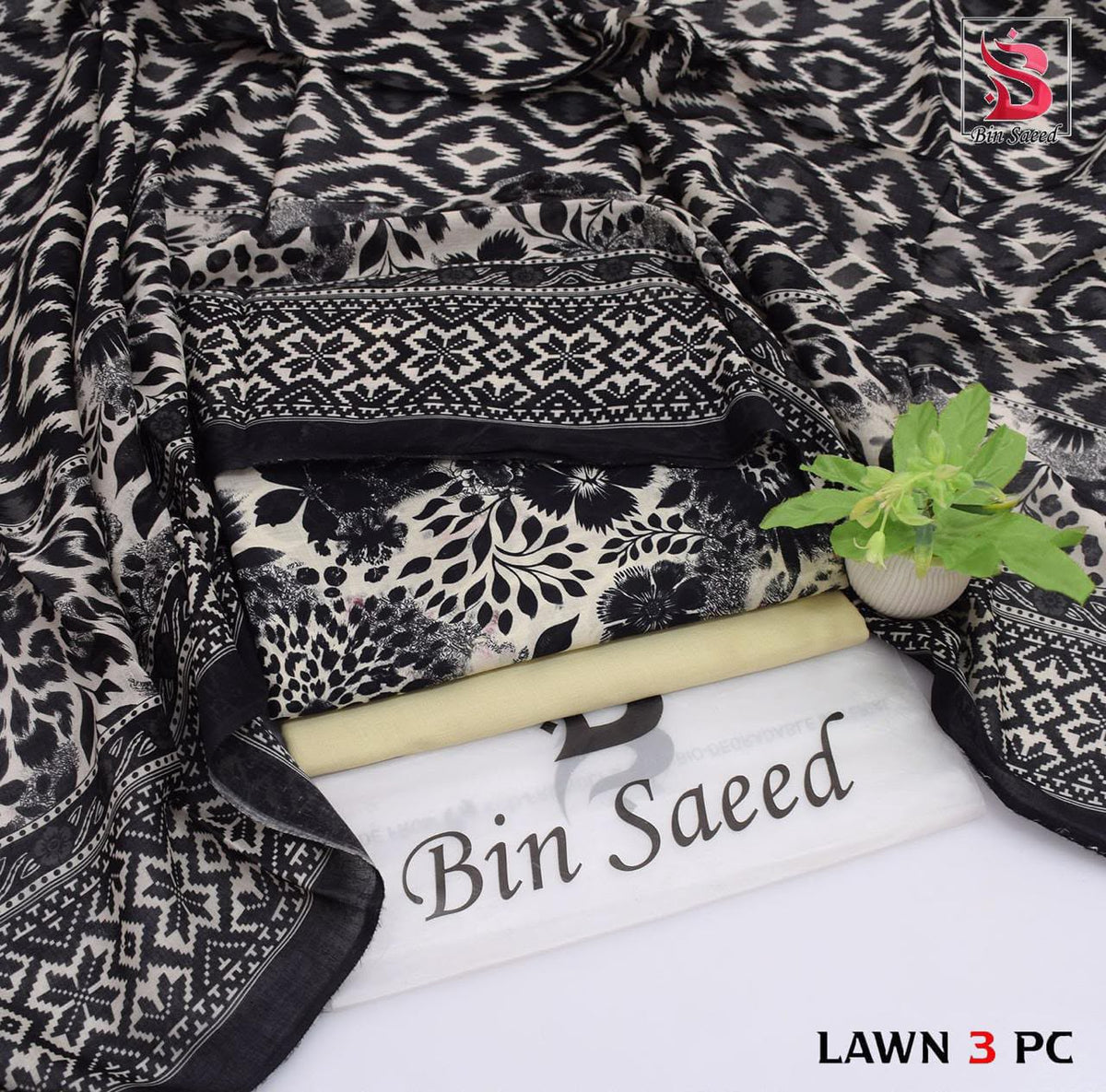Digital Printed Lawn - 3-Piece Unstitched Collection; Black and Ivory Geometric, actual fabric and design detail.