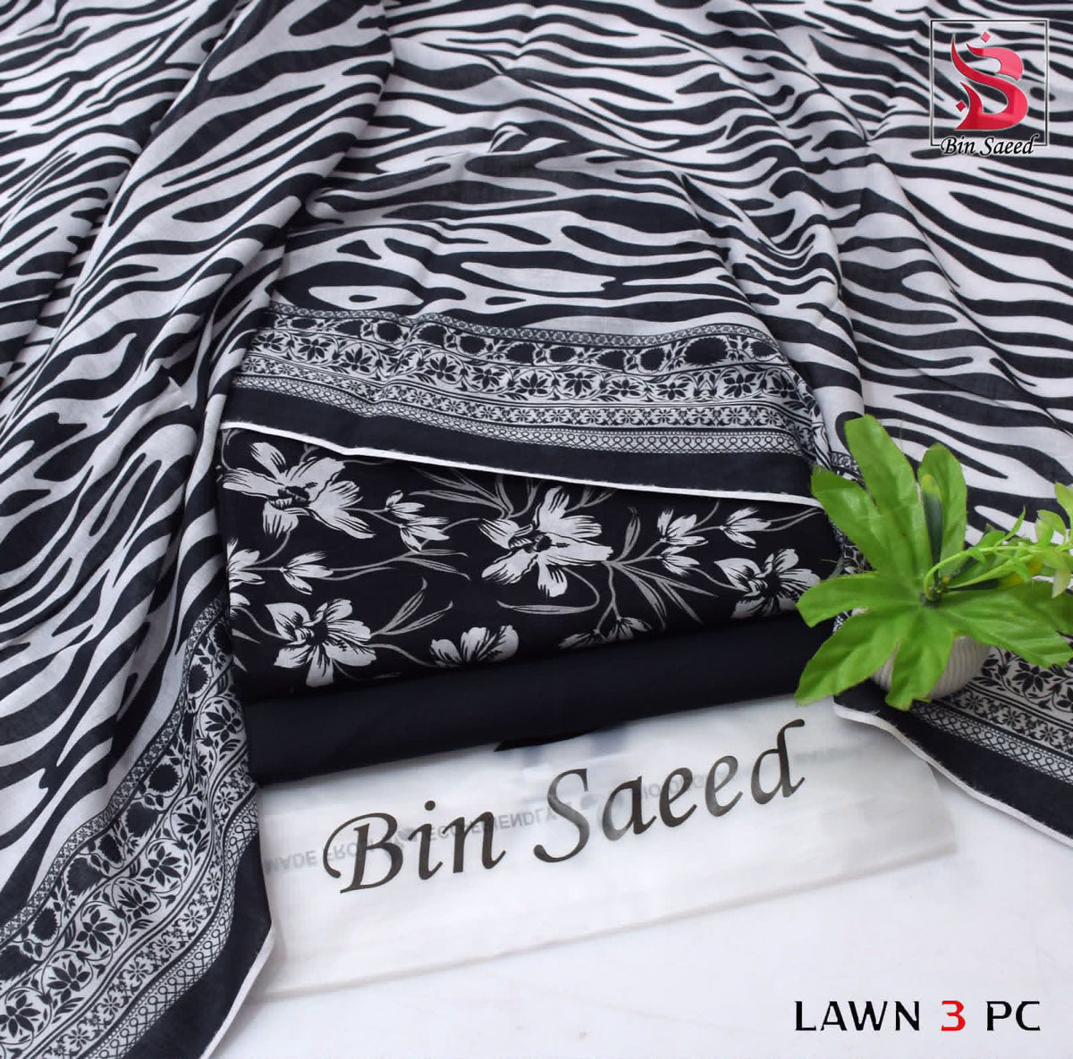 Digital Printed Lawn - 3-Piece Unstitched Collection; Black and White Botanical, actual fabric and design detail.