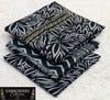 Printed Dhanak with Neckline Embroidery - 3-Piece Unstitched Collection; Black and Ivory Leaves, actual fabric and design detail.