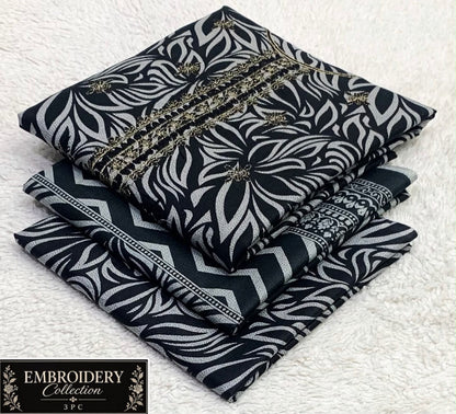Printed Dhanak with Neckline Embroidery - 3-Piece Unstitched Collection; Black and Ivory Leaves, actual fabric and design detail.