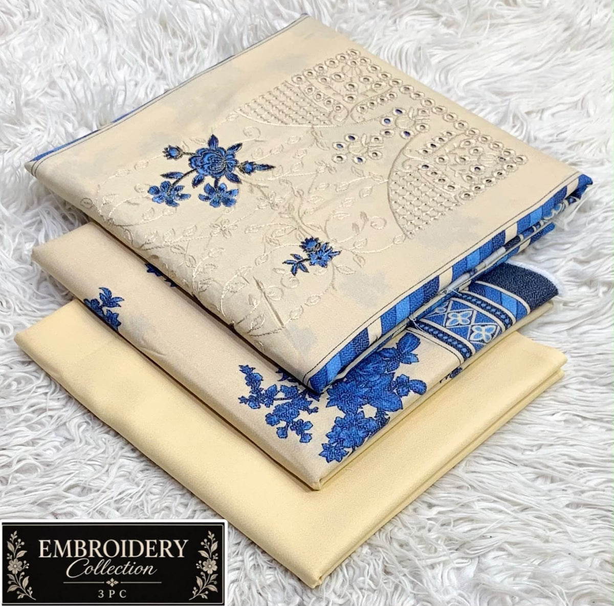 Printed Dhanak with Neckline Embroidery - 3-Piece Unstitched Collection; Cream and Blue Botanical, actual fabric and design detail.