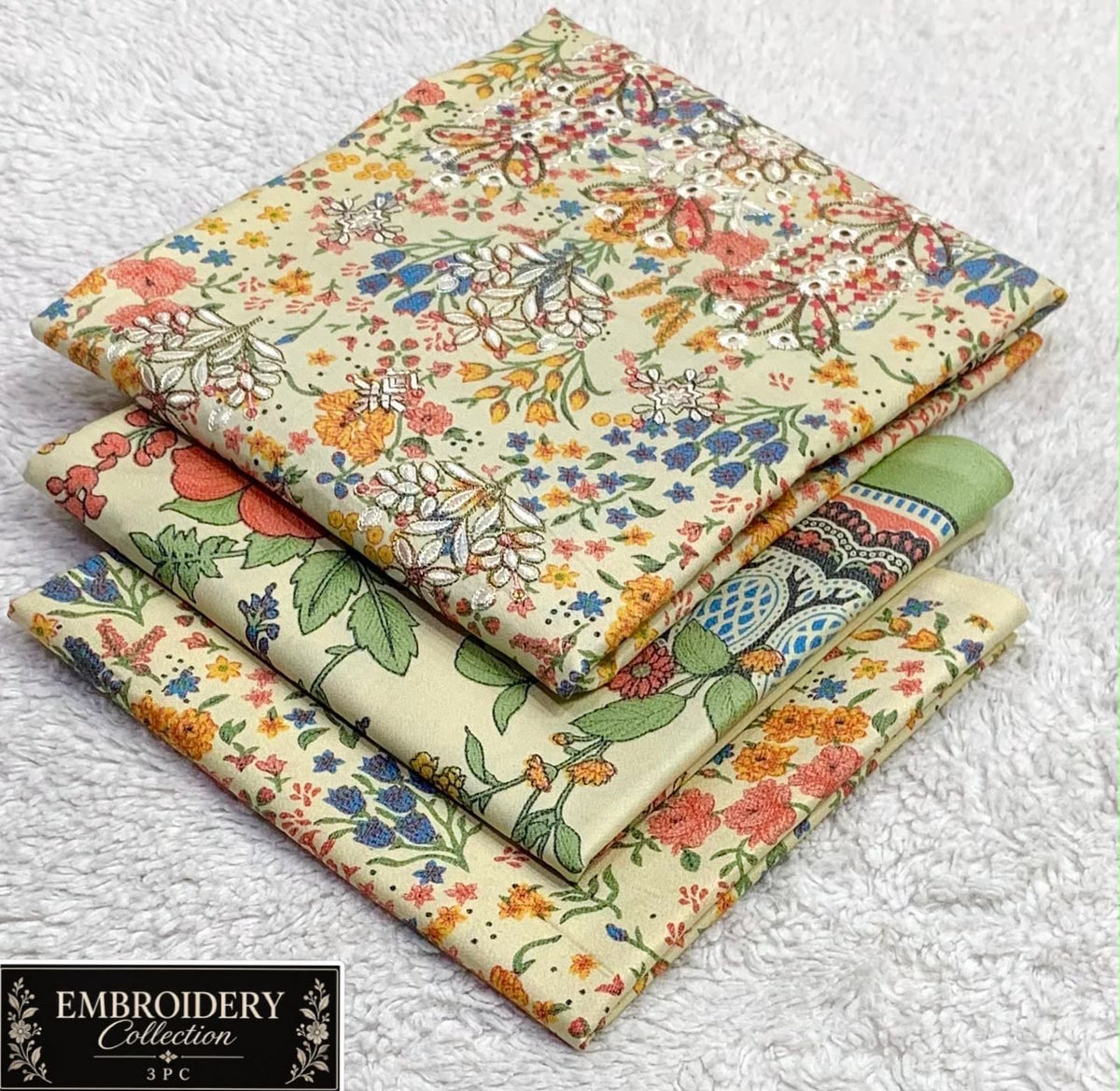 Printed Dhanak with Neckline Embroidery - 3-Piece Unstitched Collection; Ivory Wildflowers, actual fabric and design detail.