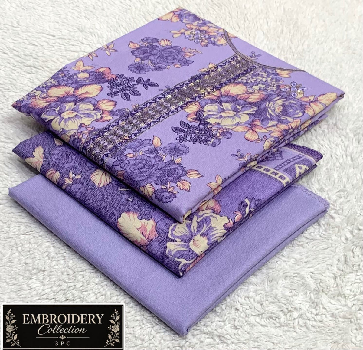 Printed Dhanak with Neckline Embroidery - 3-Piece Unstitched Collection; Lilac Floral, actual fabric and design detail.