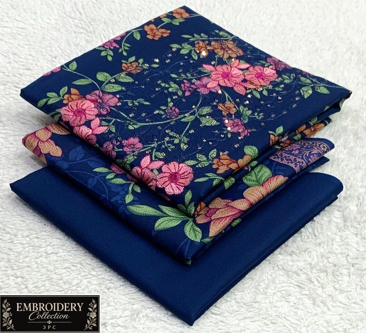 Printed Dhanak with Neckline Embroidery - 3-Piece Unstitched Collection; Navy and Pink Floral, actual fabric and design detail.