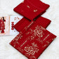 Classic Floral Embroidered Dhanak - 3-Piece Unstitched Collection; Red, actual fabric and design detail.