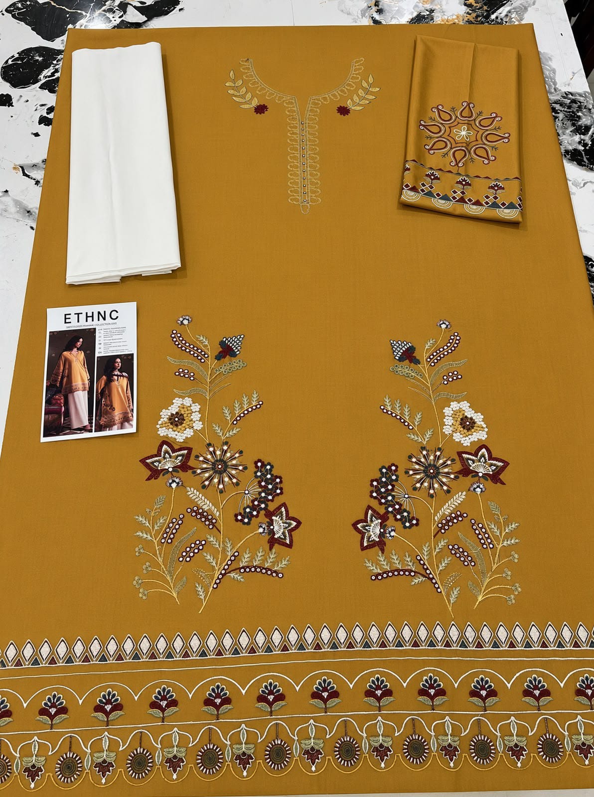 Floral and Motif Dhanak - 2-Piece Unstitched Collection; Mustard Floral Border, actual fabric and design detail.