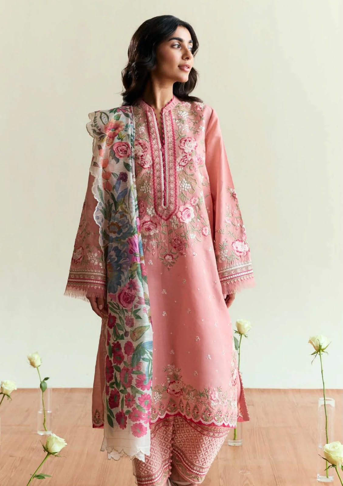 Blush embroidered Dhanak three-piece unstitched suit, original front model photograph.