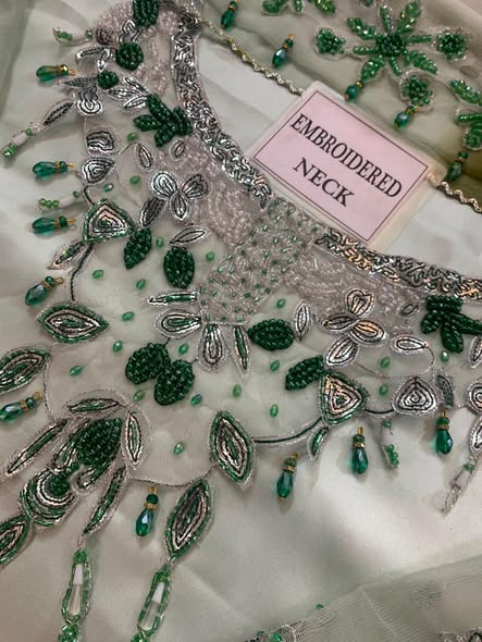 Actual Murk mint shirt fabric with embroidered neckline detail