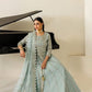 Pale sage embroidered chiffon wedding suit: original seated model photograph